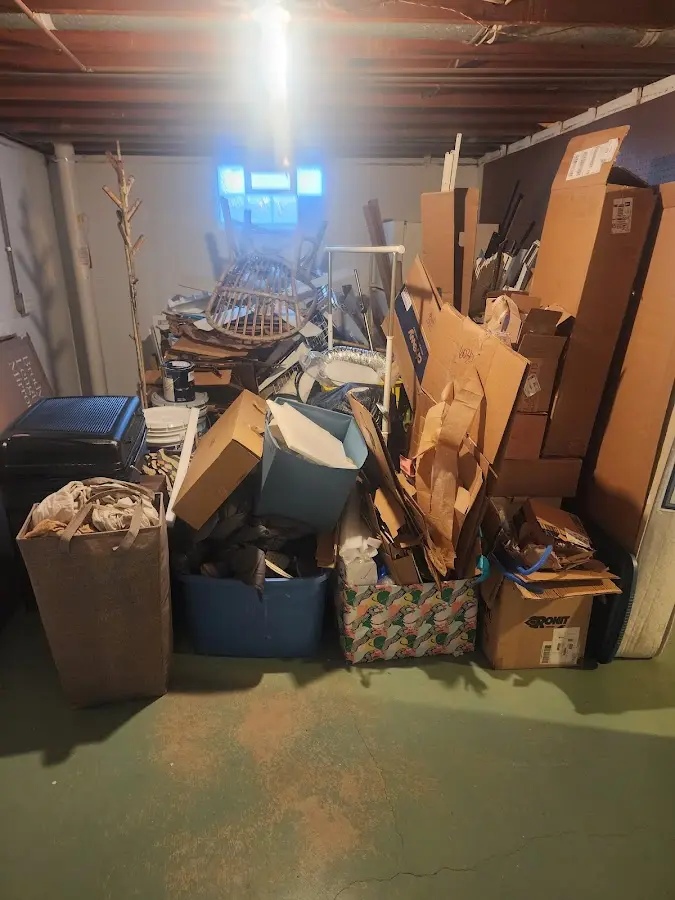 Roll-off dumpster container at job site for 6 Yard Dumpster Rental in Home Gardens